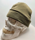 Skully Beanie - All Styles on a skull model, showcasing its comfortable and soft design for outdoor adventures.
